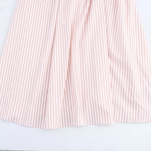 Summer striped halter maxi dress with pink and white vertical patterns and loose hemline