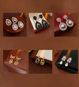 Collection of zircon water drop tassel earrings and vintage pearl studs with silver needles