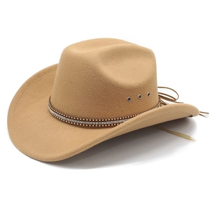 Detail of camel western cowboy hat with rhinestone gold studs and metal eyelets