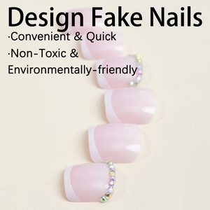 Minimalist white French press-on toe nails with pink base and sparkling rhinestones