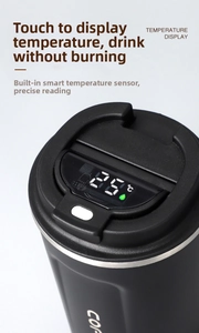 Detail of smart LED temperature display on black matte stainless steel coffee mug lid