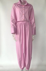 Detail view of pink and white vertical striped cropped shirt and high-waisted joggers set