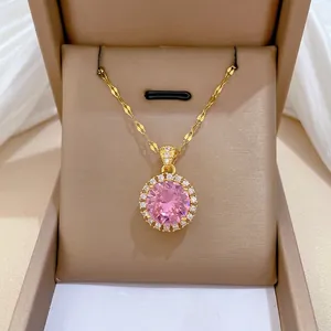 Elegant gold titanium steel necklace featuring a large round pink zircon halo pendant