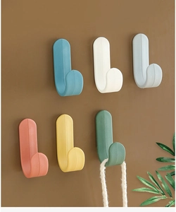 Detailed matrix display of colorful J-shaped plastic hooks with a smooth matte finish