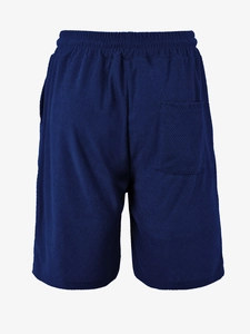 Macro detail of navy textured jacquard fabric shorts with elastic waist and back pocket