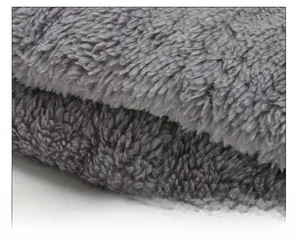 Close-up of thick grey thermal fleece lining for elderly winter knitted hats