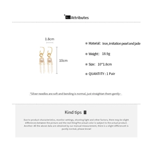 Detail view of pearl tassel earrings with 10cm length and silver needle specifications