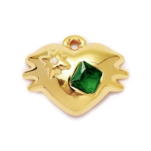 Detail of heart-shaped gold pendant with green gemstone and small pearl inlay