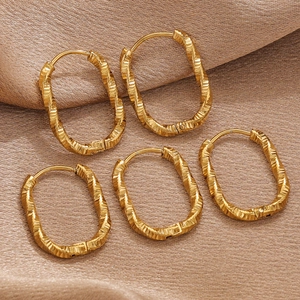 Set of five golden textured stainless steel oval hoop earrings for jewelry making