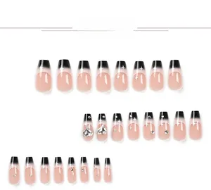 Detail of gradient press-on nails with silver stars and sparkling 3D heart rhinestones