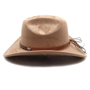 Detail of khaki suede cowboy hat with star buckle leather band and tassel accents