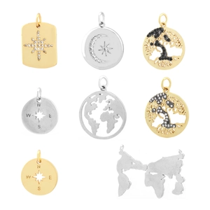 Golden and silver celestial jewelry pendants with tree of life and compass designs