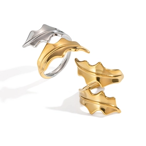 Polished seaweed design metal rings in gold and silver finish with spiral wave patterns