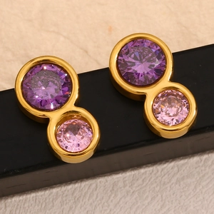 Macro shot of 18K gold plated figure-eight earrings with purple and pink zircon stones