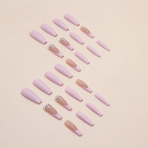 Long ballet French press-on nails in light pink with shimmering diamonds and pearls