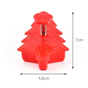Red Christmas tree cookie press mold made of plastic with spring, size 7cm by 4.8cm