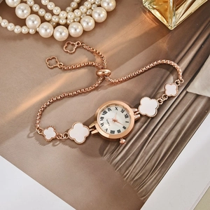 Women's rose gold clover bracelet watch with mother of pearl dial and roman numerals