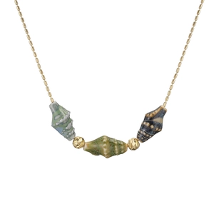 Golden chain necklace featuring colorful ceramic conch shell pendants in blue and brown hues