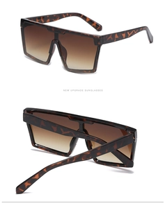 Detail of tortoise shell square sunglasses with brown gradient lenses and seamless nose pads