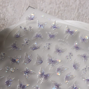 Adesivi per unghie 3D a farfalla iridescenti con finitura laser e motivi floreali