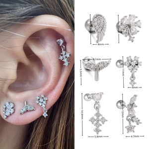 Detailed size guide of silver geometric cartilage studs with zircon wing and fish tail shapes