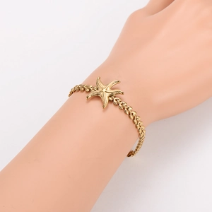 Bracelet élégant en acier inoxydable plaqué or 18 carats avec breloque étoile de mer pour femme