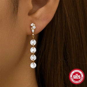 Luxurious S925 sterling silver tassel earrings with sparkling zircon gemstones on model