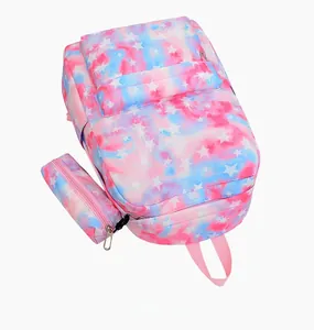 Detail view of tie-dye star pattern backpack and pencil case set with waterproof fabric