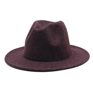 Close-up of the vintage burgundy wool felt fedora with a classic rolled brim and creased top