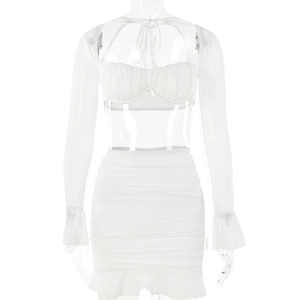 Macro view of white sheer mesh two-piece set featuring ruffled sleeves and ruched mini skirt