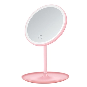 Pink desktop LED makeup mirror with round light ring and base storage tray for cosmetics