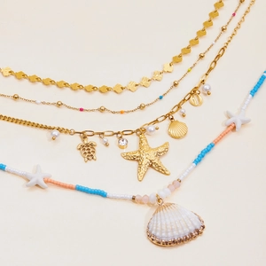Gold multi-layer necklace set with shell, starfish, turtle pendants and pearls