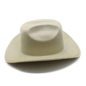 Detail of champagne gold glitter cowboy hat with sparkling texture for party and events