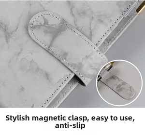 Detail of A6 marble PU leather binder with magnetic buckle and elastic pen holder loop