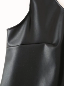Detailed close-up showing stitching and leather texture of black PU strappy dress