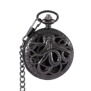 Vintage black metal pocket watch with octopus embossed cover and matching chain
