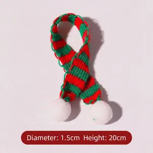 Mini red and green striped knitted scarf with white pom poms for Christmas decor