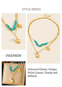 Detail of layered gold chain necklace featuring turtle charm, starfish, and turquoise stones