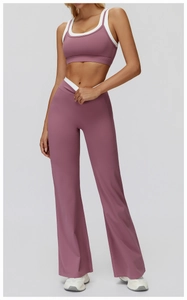 Detail showing dusty pink yoga set with V-shaped high waist and flared slit leg design