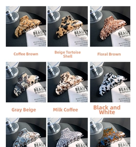 Detailed grid of large acetate hair claws featuring nine vintage tortoiseshell and leopard patterns