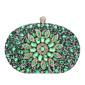 Elegant green crystal evening bag with floral jewel pattern and silver rhinestones