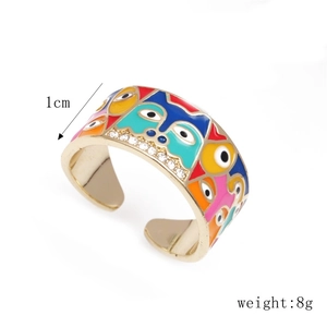 Adjustable gold ring with colorful enamel abstract eye and face patterns, 1cm width, 8g weight