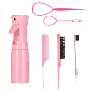 Pink hair styling tool kit featuring spray bottle, tail comb, and edge brush
