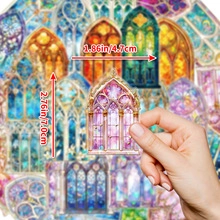 Close-up of a hand holding a waterproof PET postage stamp sticker for size comparison