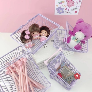 Purple wire storage baskets and mini shopping trolley for desk organization