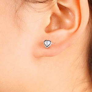 Elegant heart-shaped stud earring with a clear zircon stone on a silver metal base