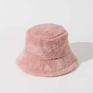 Close-up of soft pink faux fur bucket hat showing high-quality plush texture and design