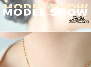 Golden fine cross chain necklace worn on model neck for a minimalist jewelry look