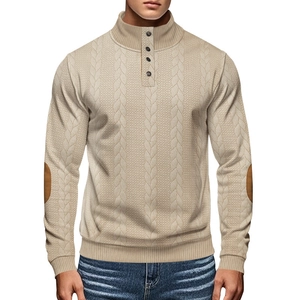 Close-up of beige cable-knit henley sweater featuring brown suede elbow patches and buttons