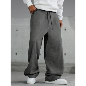 Men's retro dark grey oversized sweatpants with black drawstring in outdoor streetwear style